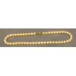 A Cultured Pearl Single Row Necklace with 9 carat gold clasp