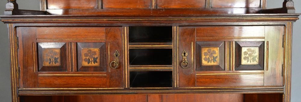 An Arts and Crafts Aesthetic Bookcase, the inlaid top above a shaped alcove with turned uprights, - Image 2 of 3