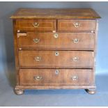 A George II Walnut Chest, the crossbanded and moulded top above two short and three long drawers