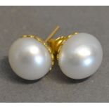 A Pair of 18 Carat Gold Cultured Pearl Set Ear Studs