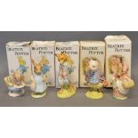 A Beswick Beatrix Potter's Figure, Mrs Rabbit, together with four other similar
