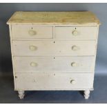 A 19th Century Painted Pine Chest of two short and three long drawers with turned legs, 96cm wide,