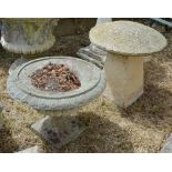 Two Weathered Concrete Garden Urns, together with a staddle stone