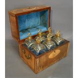 A Regency Mahogany and Marquetry and Inlaid Decanter Box, the hinged cover enclosing a fully