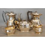 A Silver Five Piece Tea and Coffee Service comprising teapot, hot water pot, coffee pot, cream jug