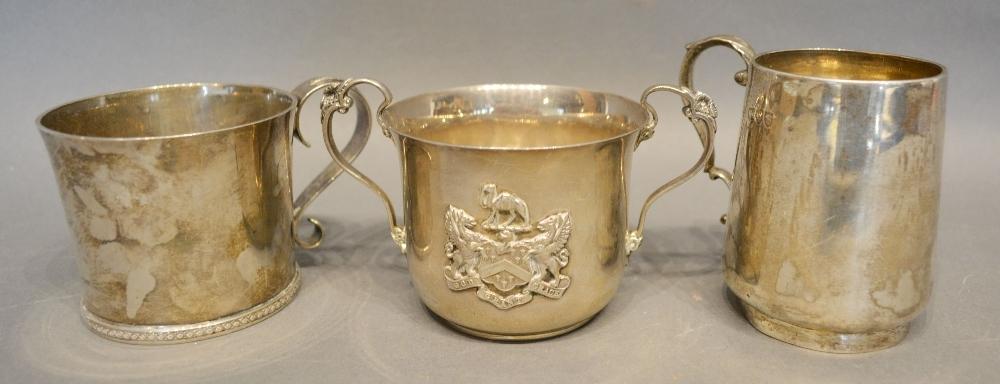 A London Silver Christening Mug, together with two other similar silver mugs, 14oz