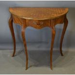 A French Gilt Metal Mounted Demilune Side Table With Parquetry Inlaid Top, above a frieze drawer