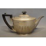 A London Silver Teapot of half lobed form, 15 oz all in