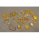 A Collection of Gold Plated Jewellery to include a watch, various chains and pendants