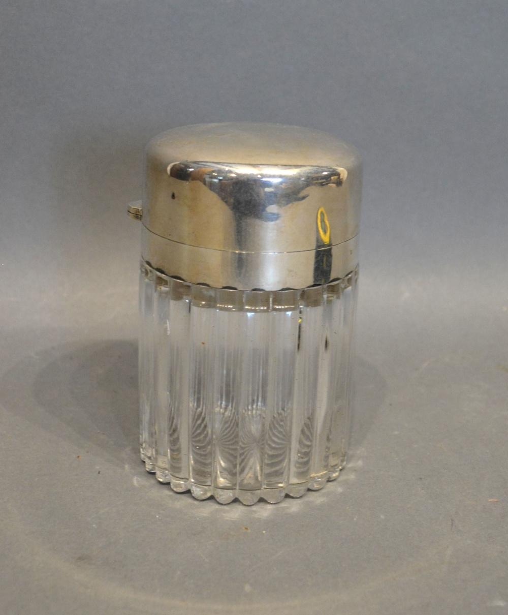An Edwardian Silver and Cut Glass Large Perfume Bottle by Asprey, London 1900