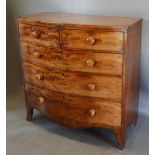 A 19th Century Mahogany Bow Fronted Chest, the crossbanded top above two short and three long