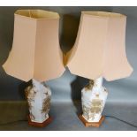 A Pair of Oriental Large Porcelain Table Lamps of hexagonal form with hardwood pierced bases, 58cm