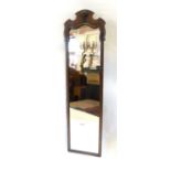 A Walnut Chippendale Style Dressing Mirror, The Shaped Shell Cresting above a rectangular plate,