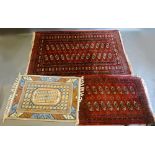 A Bokhara Woollen Rug with two rows of guls upon a red ground within multiple borders, 157 x 94cm,