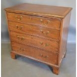 A 19th Century Mahogany Chest, the crossbanded moulded top above four long drawers with brass