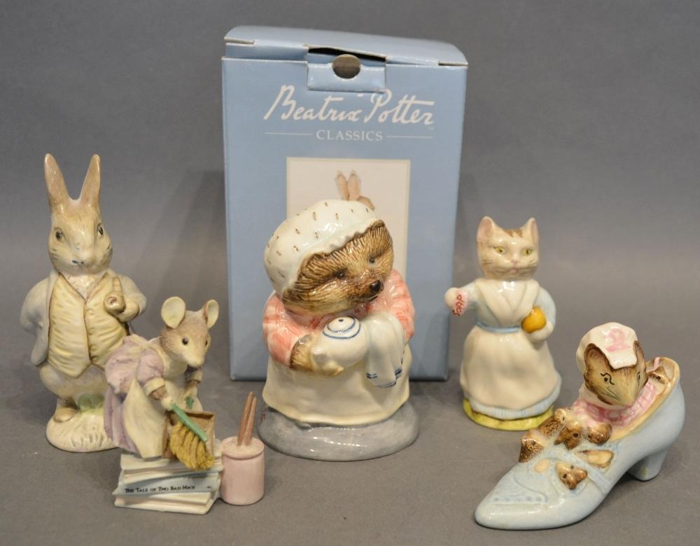 A Beswick Beatrix Potter's Figure, Tabitha Twitchett, together with another similar and three