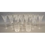 A Collection of Thirteen Waterford Cut Glass Champagne Flutes, together with 2 similar Waterford