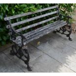 A Coalbrookdale Wrought iron and Wooden Slatted Garden Bench with grape and serpent ends,