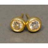 A Pair of 18 Carat Gold Diamond Ear Studs, approximately 0.40 carat each