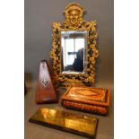 A Brass Wall Mirror Of Pierced Outline And With Mask Head Cresting, 48cm by 23cm, together with a