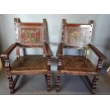 A Pair Of 17th Century Style Armchairs, The Polychrome Leather Backs bearing crests above similar