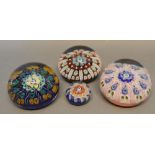 A Strathearn Millefiori Glass Paperweight, together with three other similar paperweights