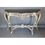A French Silvered Console Table The Serpentine Marble Top Above A Pierced Frieze, raised upon
