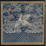 A Early Chinese Silkwork Panel depicting a bird amongst clouds and foliage and with gold thread