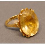 An 18 Carat Gold Dress Ring set large oval citrine