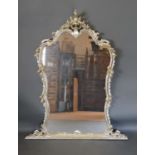 A French Large Silvered Over Mantle Mirror With Scroll Pierced Cresting, 144cm by 119cm