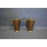 A Pair of Copper and Brass Covered Jugs by W.A.S. Benson, 23 cms tall