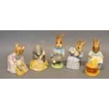 A Beswick Beatrix Potter's Figure, Peter Rabbit, together with four other similar