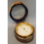 A Late 19th/Early 20th Century Brass Aneroid Barometer within original case bearing label