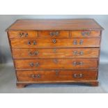 A George III Mahogany Chest, the crossbanded top above three short and four long drawers with