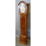 A 20th Century Walnut Longcase Clock, the engraved brass dial with silvered chapter ring with Arabic