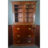 A 19th Century Mahogany Library Bookcase, the moulded cornice above two glazed doors enclosing