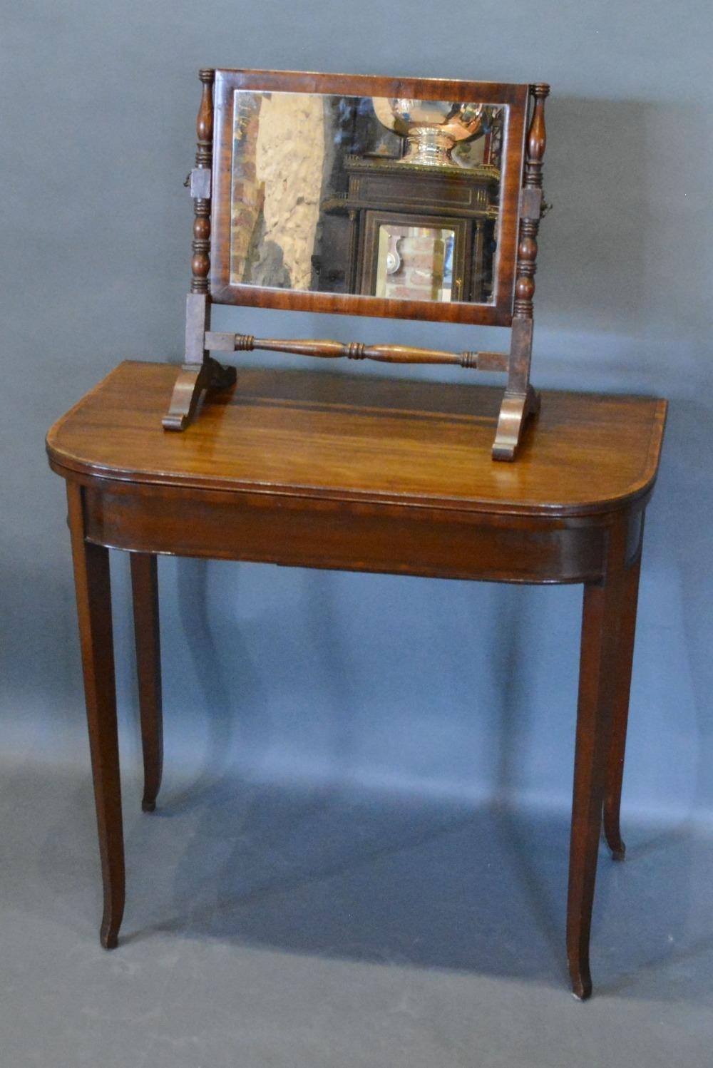 A Mahogany Satinwood Cross Banded Card Table, the hinged top above a plain frieze raised upon