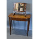 A Mahogany Satinwood Cross Banded Card Table, the hinged top above a plain frieze raised upon