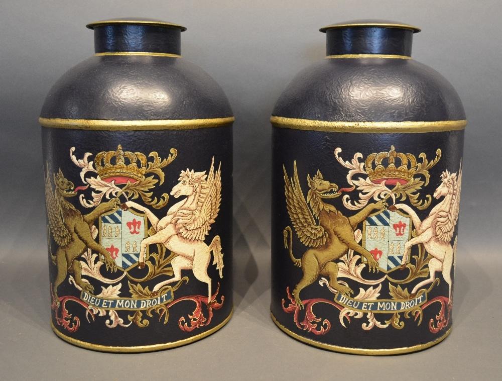 A Pair Of Navy Blue And Gilded Armorial Toleware Canisters, 36cm tall