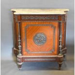 A French Kingwood Gilt Metal Mounted Pier Cabinet, the marble top above a frieze drawer and