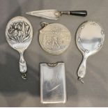 A Sterling Silver Vesta Case of Circular Form, golf related, together with two miniature silver