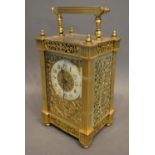 A 19th Century French Brass Cased Carriage Clock, the enamelled dial with Arabic numerals and with