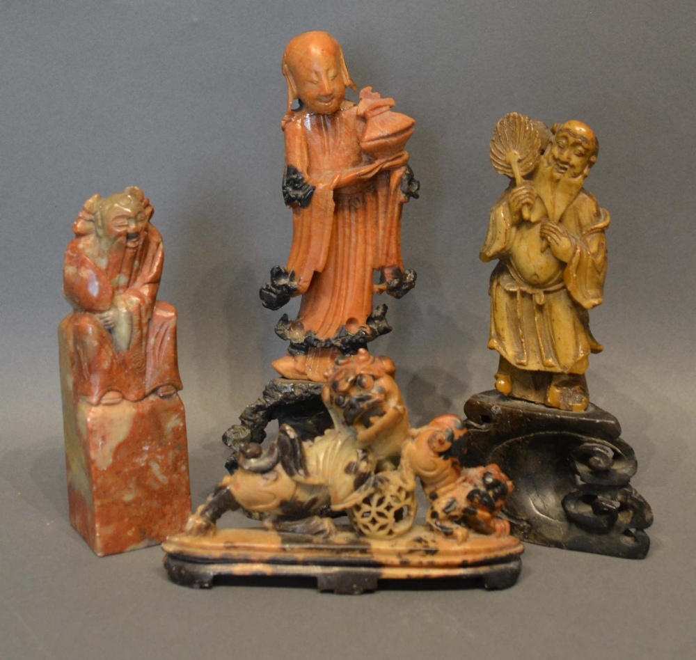 A Chinese Soapstone Figure in the form of a tradesman, 19cm tall, together with three other
