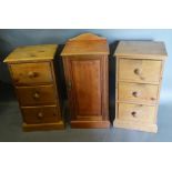 A Pair of Pine Three Drawer Chests, together with another similar Edwardian bedside cupboard