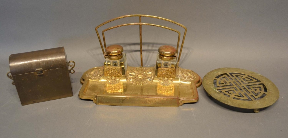 An Art Nouveau Brass Ink Stand, together with a domed small casket and a brass stand