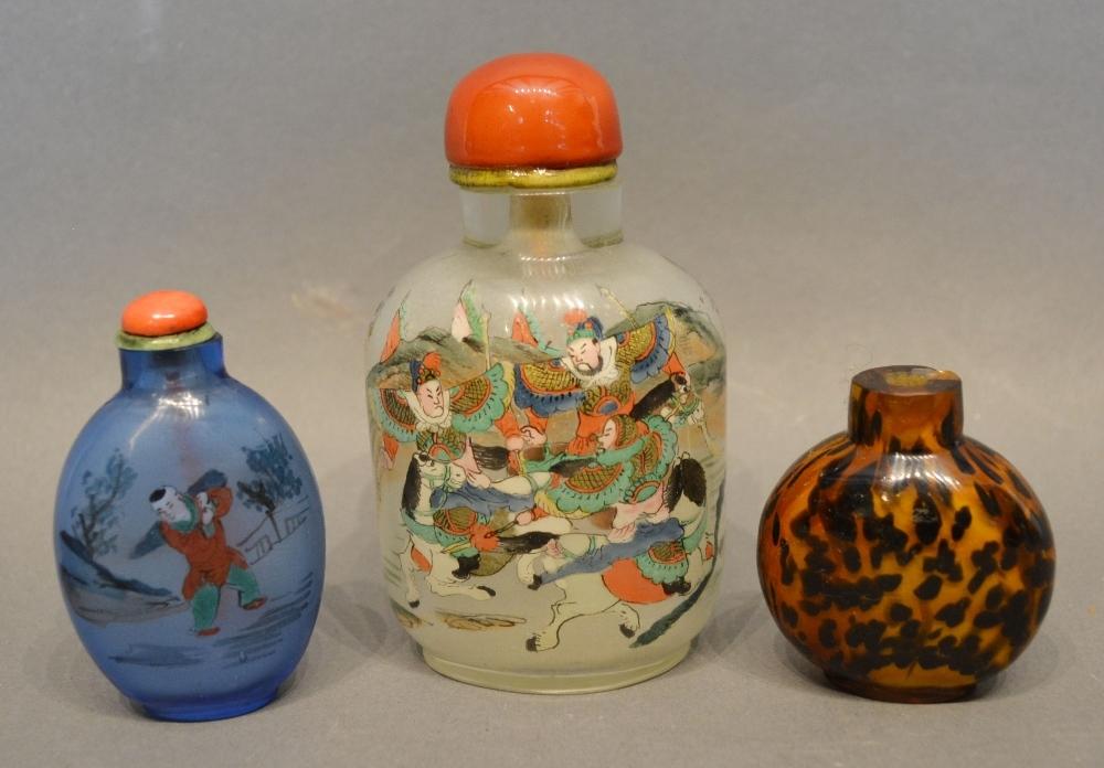 A 19th Century Chinese Large Glass Scent Bottle, hand painted with warriors and figures within a