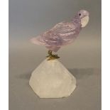 A Rock Crystal Model in the Form of a Parrot, upon a shaped base, 12cm tall