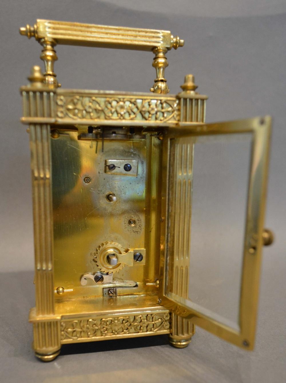 A 19th Century French Brass Cased Carriage Clock, the enamelled dial with Arabic numerals and with - Image 2 of 2