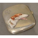An 800 Mark Silver Cigarette Case, the front enamel decorated with a dog, 9 x 8cm