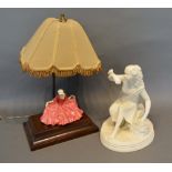 A Royal Doulton Figurine, Polly Peacham, Beggar's Opera, HN549, mounted as a table lamp, together
